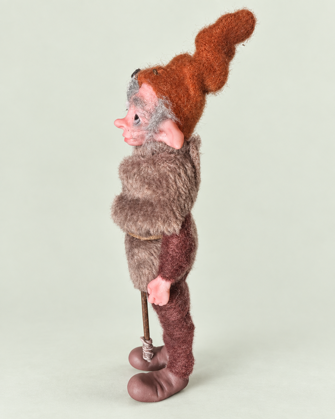 Albin — side view 2, soft pale sage background