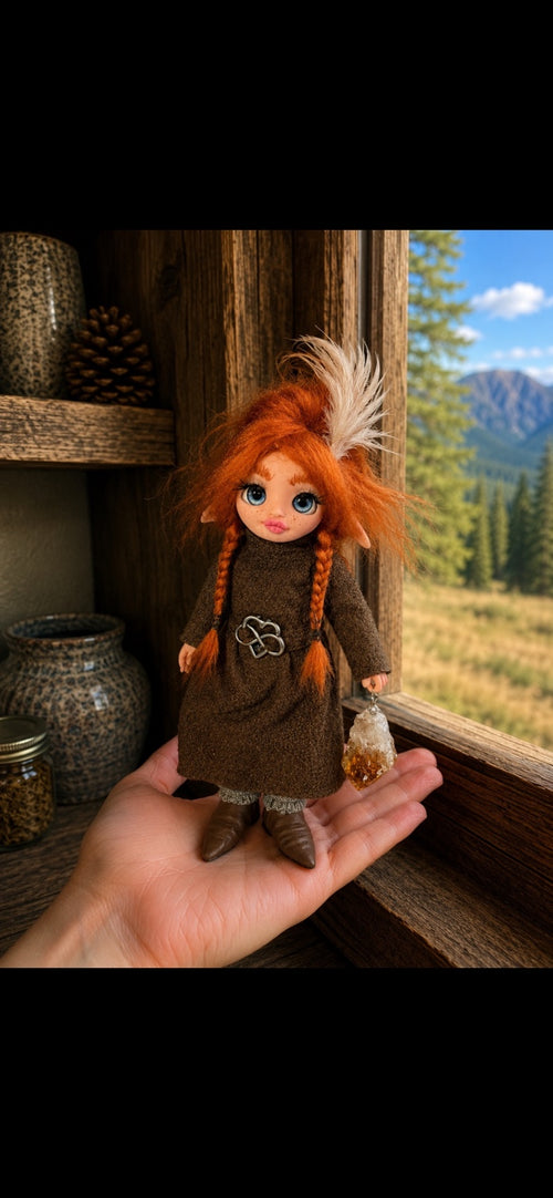Aurneva, Pixie of the Amber Thread, handmade Pixie shown in hand for scale