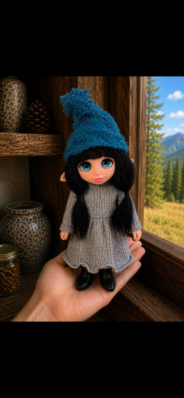 Iselune, Pixie of the Blue Silence, handmade Pixie shown in hand for scale