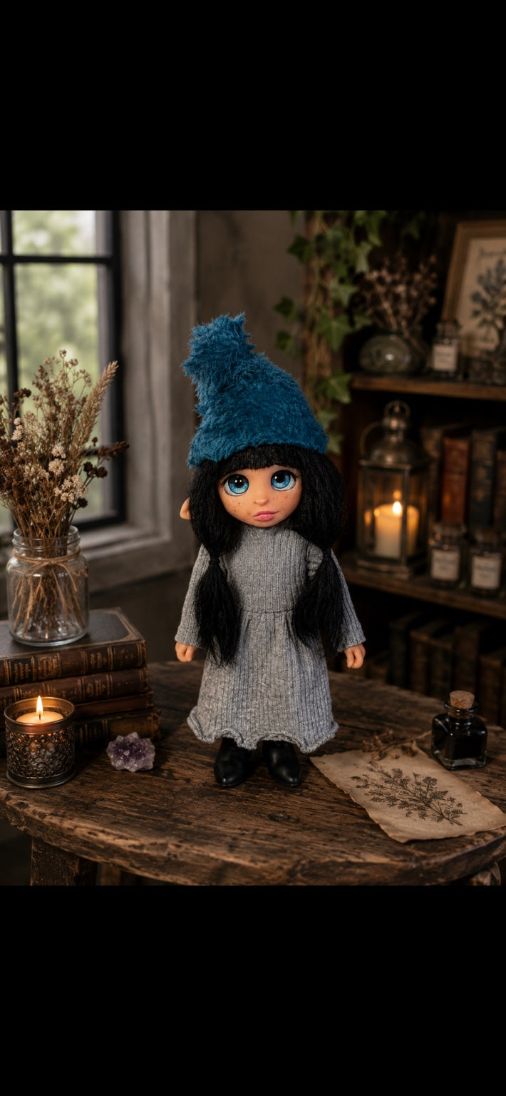 Iselune handmade Pixie in a warm botanical room with books and candlelight