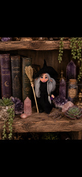 Mireva handmade Pixie with broom and amethyst among crystals and forest books