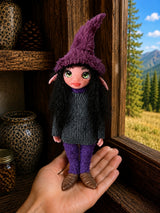 Nythara, Pixie of the Violet Hearth, handmade Pixie shown in hand for scale