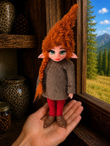 Orivelle, Pixie of the Ember Seed, handmade Pixie shown in hand for scale