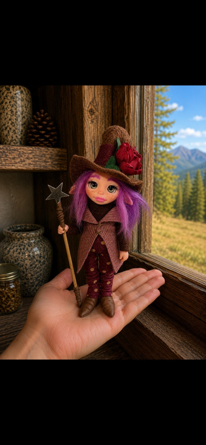 Sorelia, Pixie of the Star-Rose, handmade Pixie shown in hand for scale