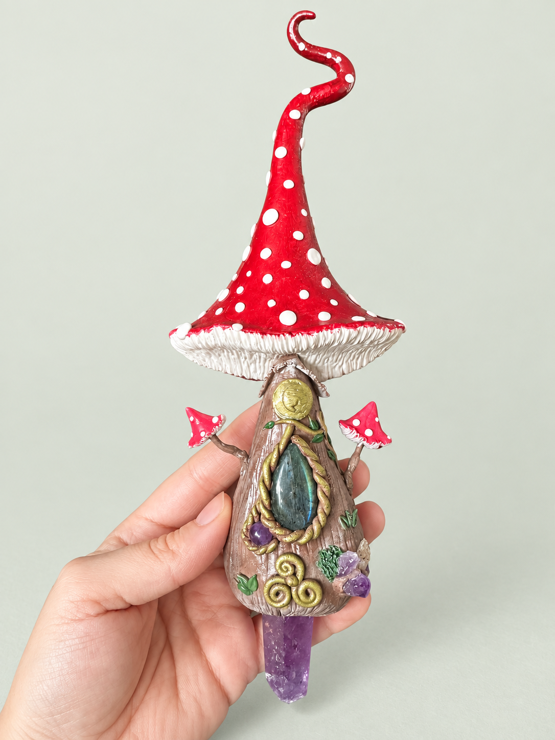 Mushroom talisman · in hand