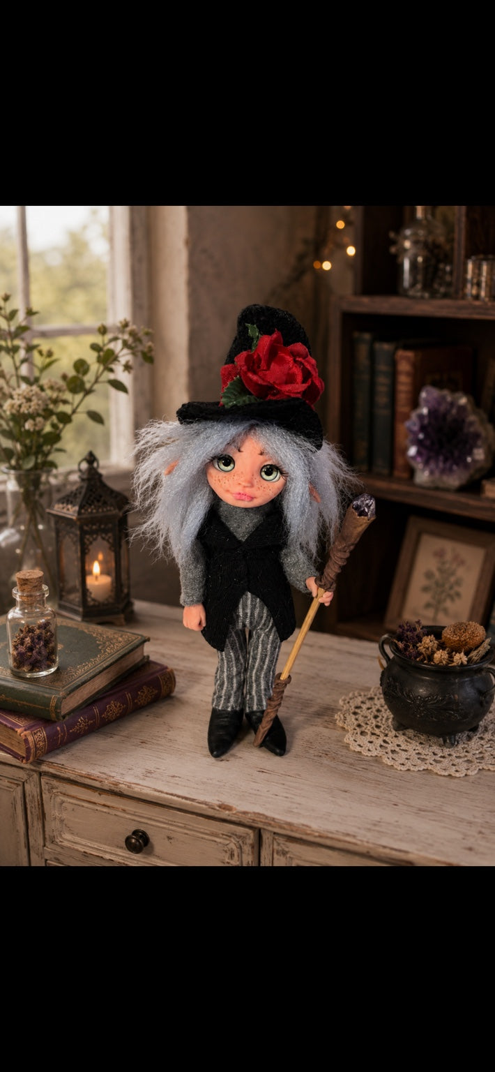 Thalvera handmade Pixie holding an amethyst staff in a warm botanical room