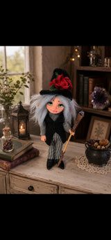 Thalvera handmade Pixie holding an amethyst staff in a warm botanical room