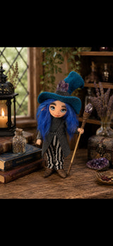 Vaelith handmade Pixie holding an amethyst staff in a warm magical setting
