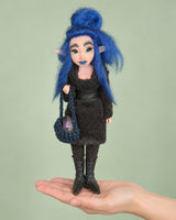 Vero held in a hand to show scale